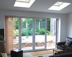 Large glass doors that allow plenty of natural light into the extension.